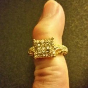 women's size 5 engagement ring, gold tone with cubit diamonds